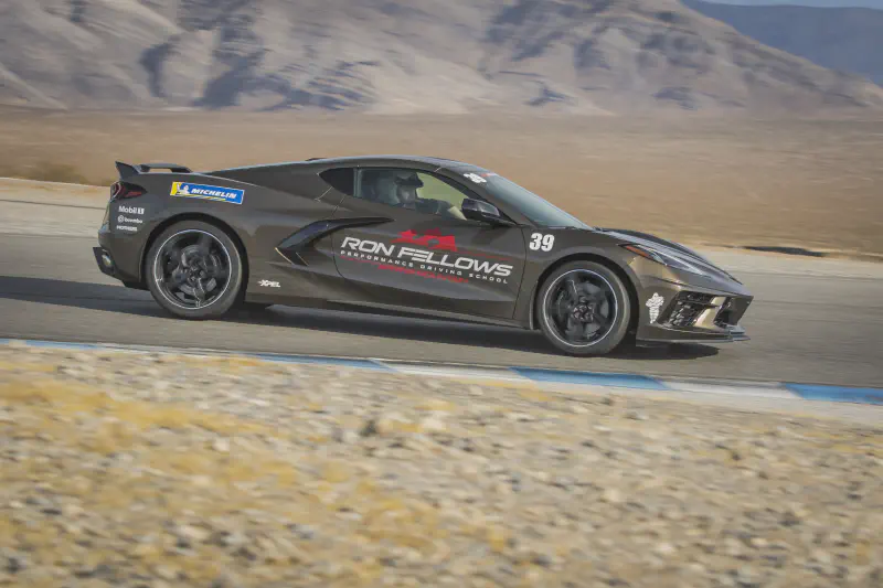Pushing a C8 through a turn at speed on the Spring Mountain track
